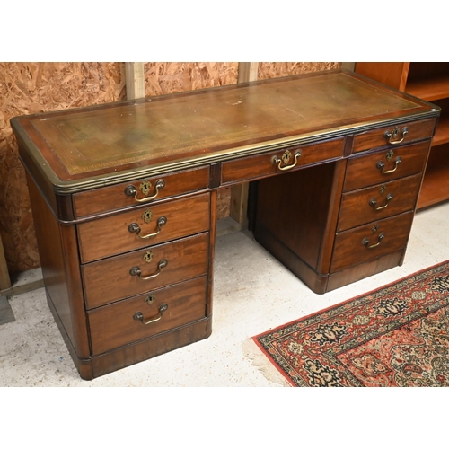 110 - A 19th century mahogany and brass mounted twin pedestal desk with gilt tooled green leather top over... 