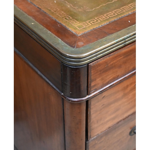 110 - A 19th century mahogany and brass mounted twin pedestal desk with gilt tooled green leather top over... 