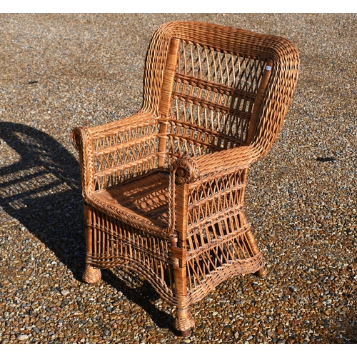 112 - A bamboo and wicker conservatory armchair, a wicker armchair with adjustable highback and pull-out s... 