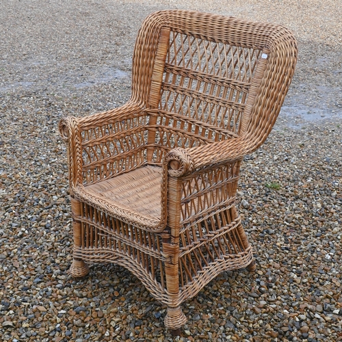 112 - A bamboo and wicker conservatory armchair, a wicker armchair with adjustable highback and pull-out s... 