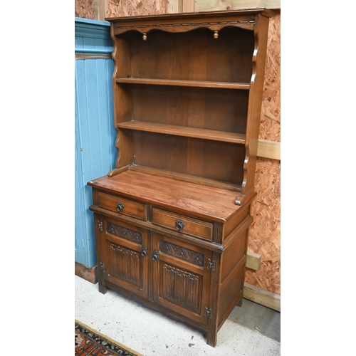 113 - An Old Charm style carved oak dresser, 94 cm wide x 44 cm deep x 176 cm high