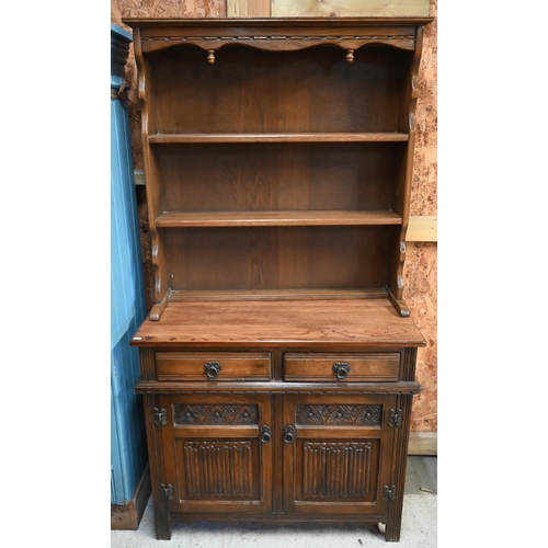 113 - An Old Charm style carved oak dresser, 94 cm wide x 44 cm deep x 176 cm high