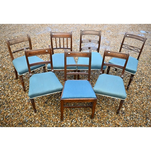 118 - A harlequin set of seven Regency mahogany dining chairs with blue fabric seats