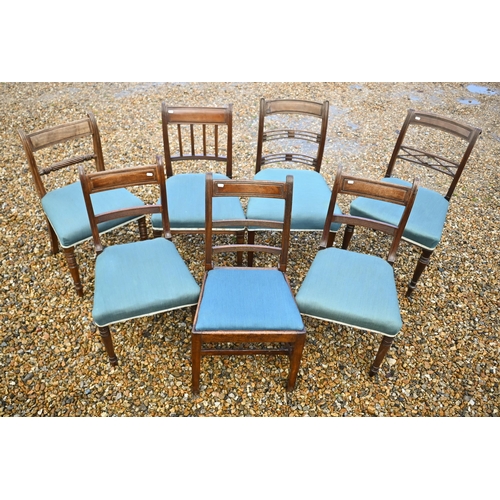 118 - A harlequin set of seven Regency mahogany dining chairs with blue fabric seats