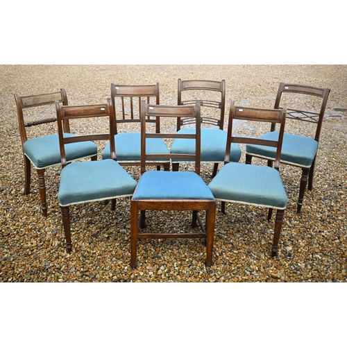 118 - A harlequin set of seven Regency mahogany dining chairs with blue fabric seats