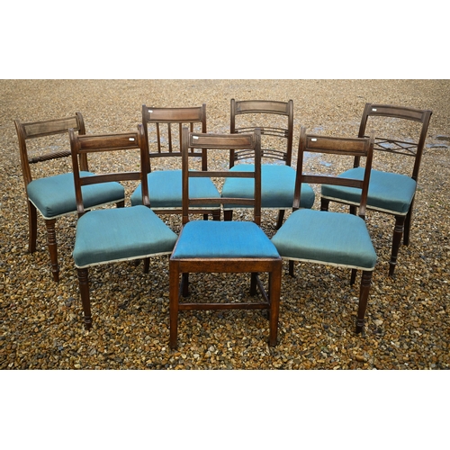 118 - A harlequin set of seven Regency mahogany dining chairs with blue fabric seats