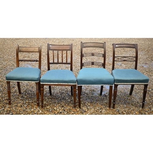 118 - A harlequin set of seven Regency mahogany dining chairs with blue fabric seats