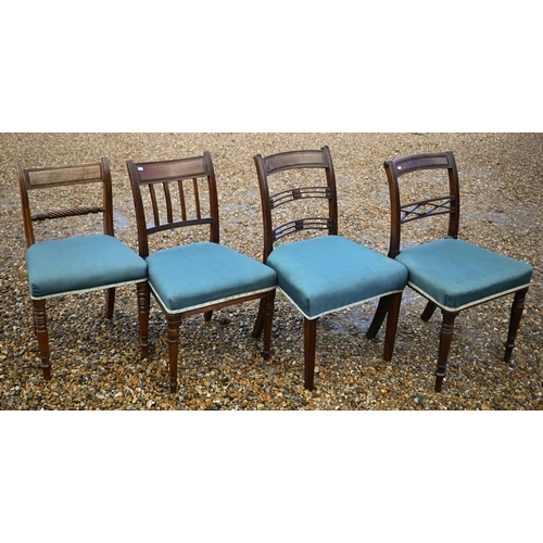 118 - A harlequin set of seven Regency mahogany dining chairs with blue fabric seats