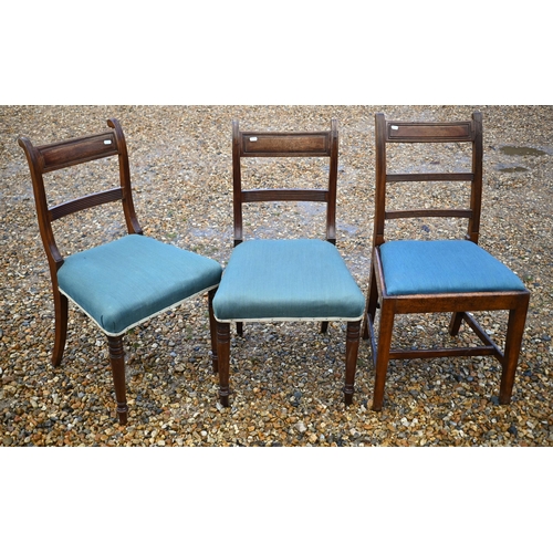 118 - A harlequin set of seven Regency mahogany dining chairs with blue fabric seats