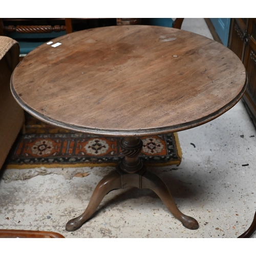 122 - A 19th century mahogany circular tilt-top table on tripod base with turned column, 82 cm diam