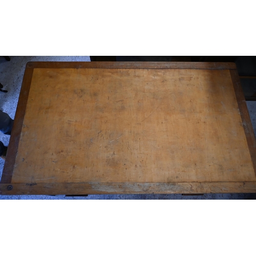 125 - # An oak workshop table with two drawers, 150 x 90 x 76 cm