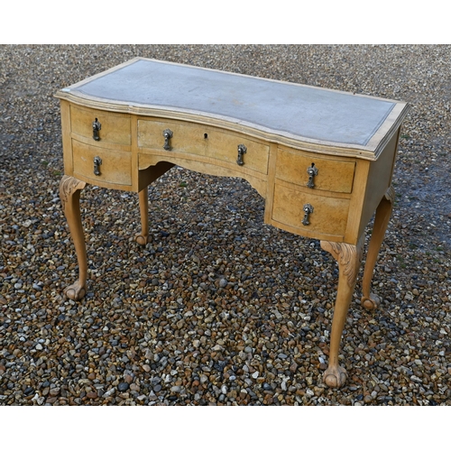 130 - A Queen Anne style kneehole desk on cabriole supports with ball and claw feet, 100 x 50 x 76 cm high... 