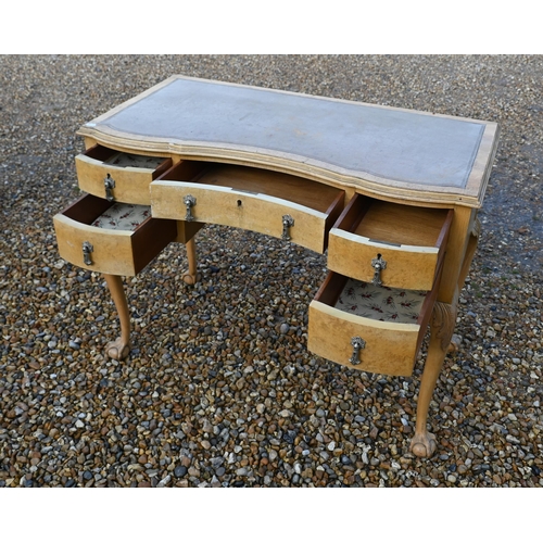 130 - A Queen Anne style kneehole desk on cabriole supports with ball and claw feet, 100 x 50 x 76 cm high... 