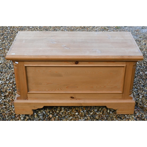 132 - A waxed pine blanket chest, 94 cm wide x 46 cm deep x 50 cm high