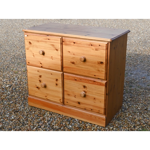 133 - A stained pine four drawer filing chest, 100 cm x 50 cm x 86 cm high