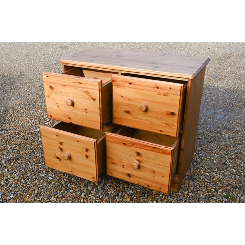 133 - A stained pine four drawer filing chest, 100 cm x 50 cm x 86 cm high