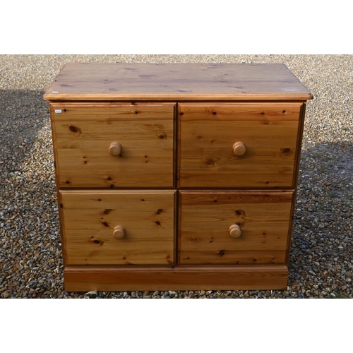 133 - A stained pine four drawer filing chest, 100 cm x 50 cm x 86 cm high