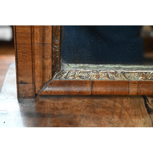 134 - A 19th century walnut toilet mirror on three drawer platform base