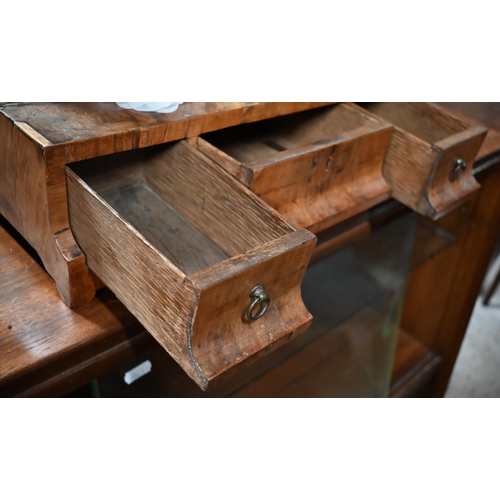 134 - A 19th century walnut toilet mirror on three drawer platform base