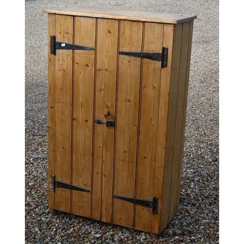 137 - A rustic waxed pine two door cupboard, 80 x 36 x 130 cm high