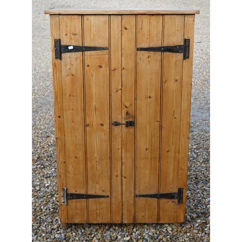 137 - A rustic waxed pine two door cupboard, 80 x 36 x 130 cm high