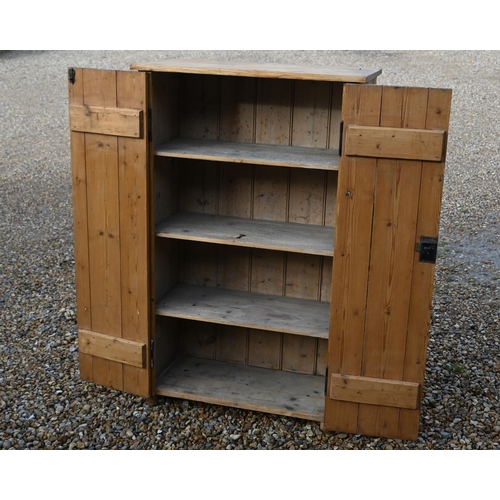 137 - A rustic waxed pine two door cupboard, 80 x 36 x 130 cm high