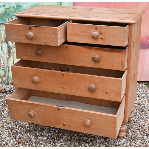 140 - A Victorian pine chest of two short over three long drawers, turned handles and legs, 110 x 48 x 110... 