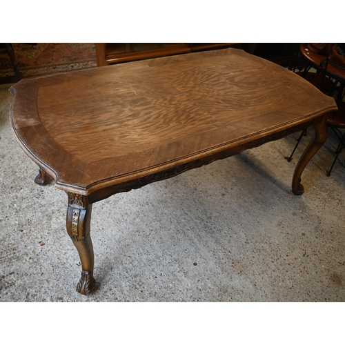 142 - # A French oak carved walnut dining table with shaped rectangular top, 180 cm x 100 x 76 cm