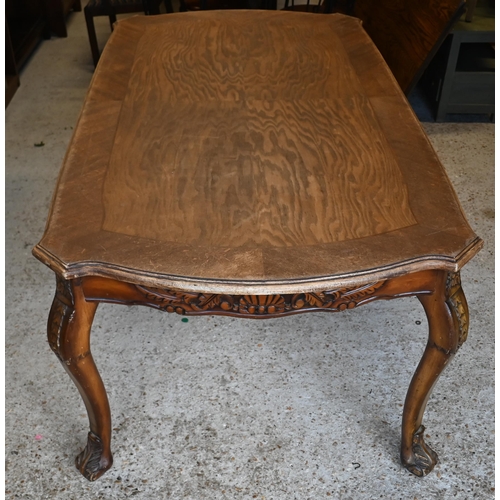 142 - # A French oak carved walnut dining table with shaped rectangular top, 180 cm x 100 x 76 cm