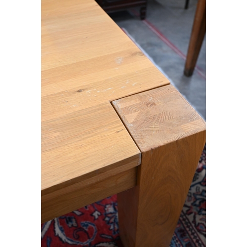 17 - A large contemporary light oak corner-leg dining table, rectangular top with square supports (remove... 