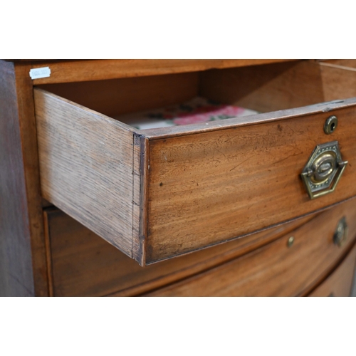 21 - A 19th century mahogany bowfront chest of two short over three long drawers on splayed bracket feet,... 