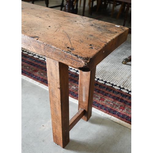 27 - An antique French elm and fruitwood rustic workbench on block trestle supports, 200 cm wide x 40 cm ... 