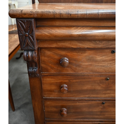 3 - A large Victorian mahogany chest of drawers with cavetto drawer over four standard drawers, on bun f... 