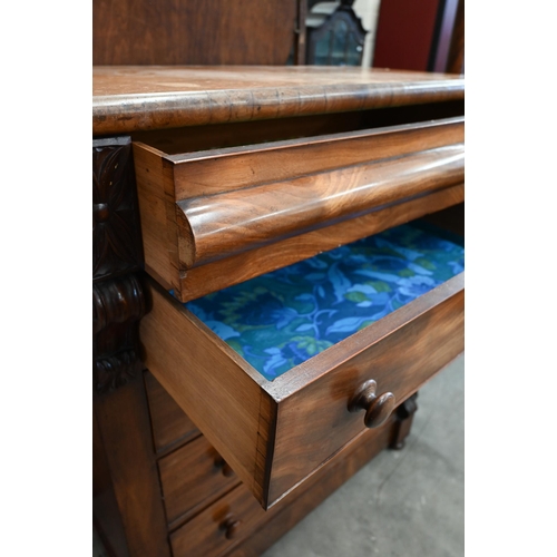 3 - A large Victorian mahogany chest of drawers with cavetto drawer over four standard drawers, on bun f... 