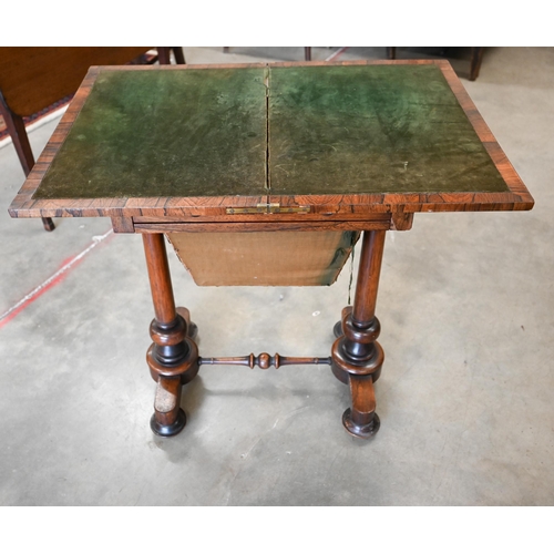 30 - A Victorian rosewood folding sewing table with compartmentalised drawer and wool box on twin column ... 