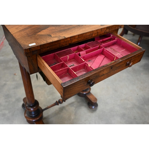 30 - A Victorian rosewood folding sewing table with compartmentalised drawer and wool box on twin column ... 