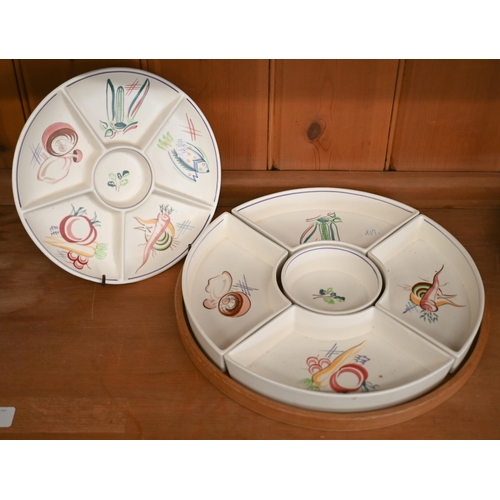 386 - A Poole pottery five-piece hors d'oeuvres set, painted with vegetables, on wooden tray, 31 cm, to/w ... 