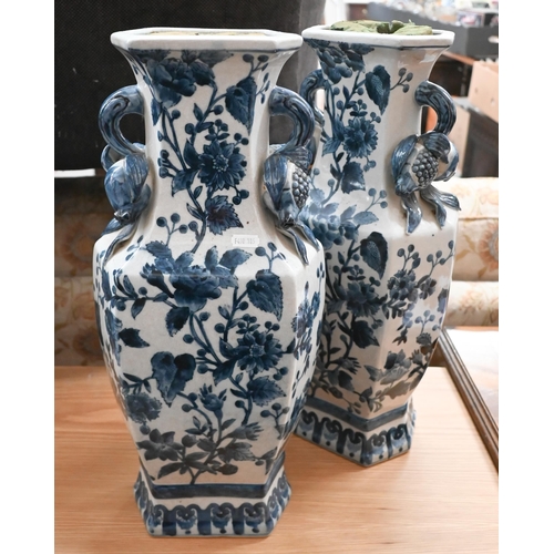 390 - Two pairs of large Chinese blue and white floral-painted vases, 59 cm (with covers) and 48 cm (4)