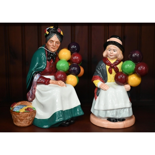 392 - Five Royal Doulton figures - 'The Balloon Seller' HN 1315, 'Balloon Lady' HN 2935, 'Dinky Do' HN 167... 