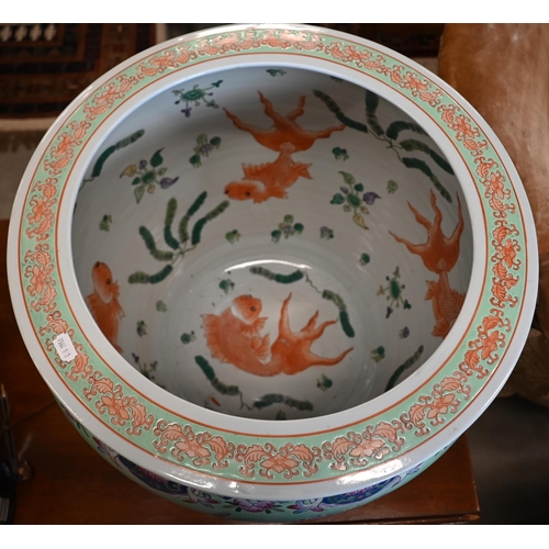 398 - A Chinese porcelain fish-bowl, the interior painted with goldfish, the outside with flowers and inse... 