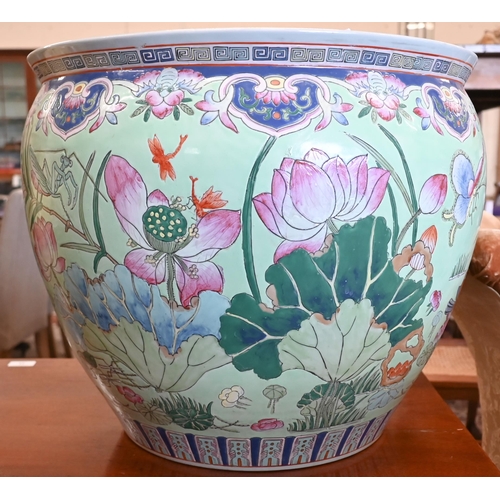 398 - A Chinese porcelain fish-bowl, the interior painted with goldfish, the outside with flowers and inse... 