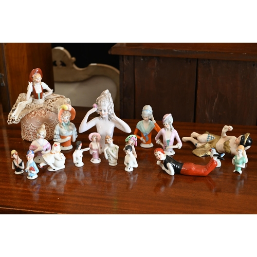 400 - A collection of vintage china pin-cushion figures and reclining female figures, etc