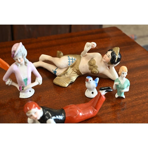 400 - A collection of vintage china pin-cushion figures and reclining female figures, etc