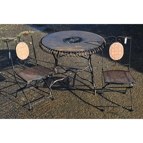 410 - A circular metal terrace table (100 cm diam) and c/w two tile backed folding chairs