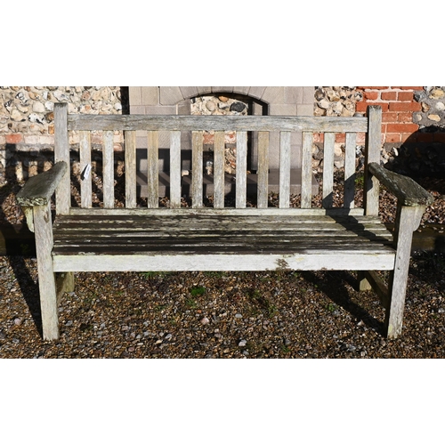 411 - A weathered teak slatted garden bench, 160 cm wide