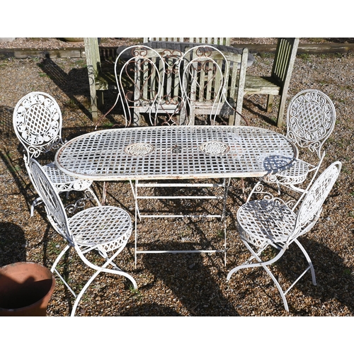 413 - A painted metal lattice-work patio set comprising table, four chairs, two parasols to/w painted wrou... 