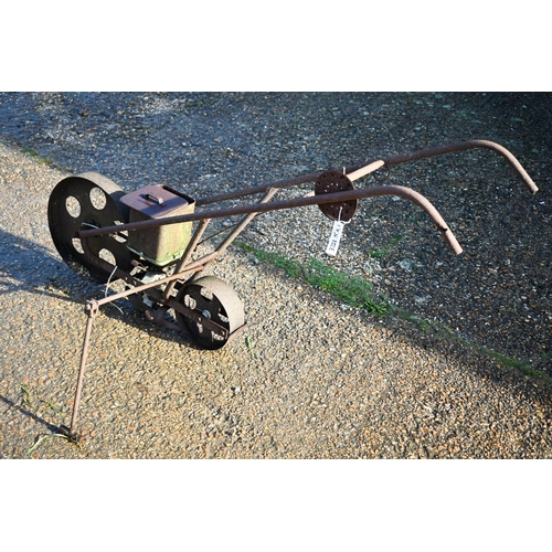 414 - An antique cast iron garden seeder a/f