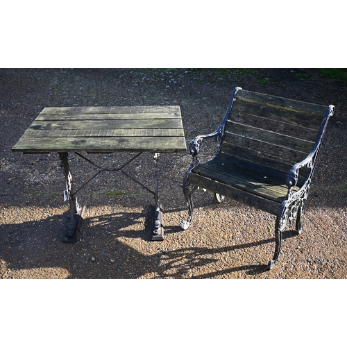 415 - A weathered teak and cast iron garden table, 90 cm wide x 66 cm deep x 72 cm high to/w a somewhat si... 