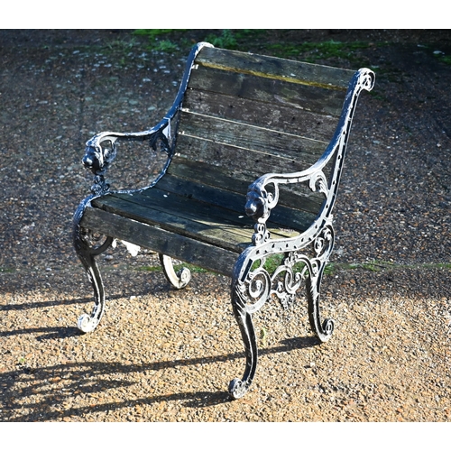 415 - A weathered teak and cast iron garden table, 90 cm wide x 66 cm deep x 72 cm high to/w a somewhat si... 