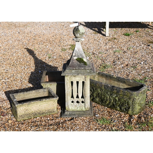 418 - A reconstituted weathered stone Portuguese chimney pot, 90 cm high, two cast stone trough planters a... 